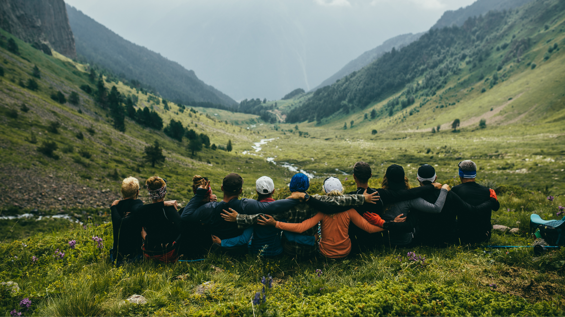 Group sitting in the mountains