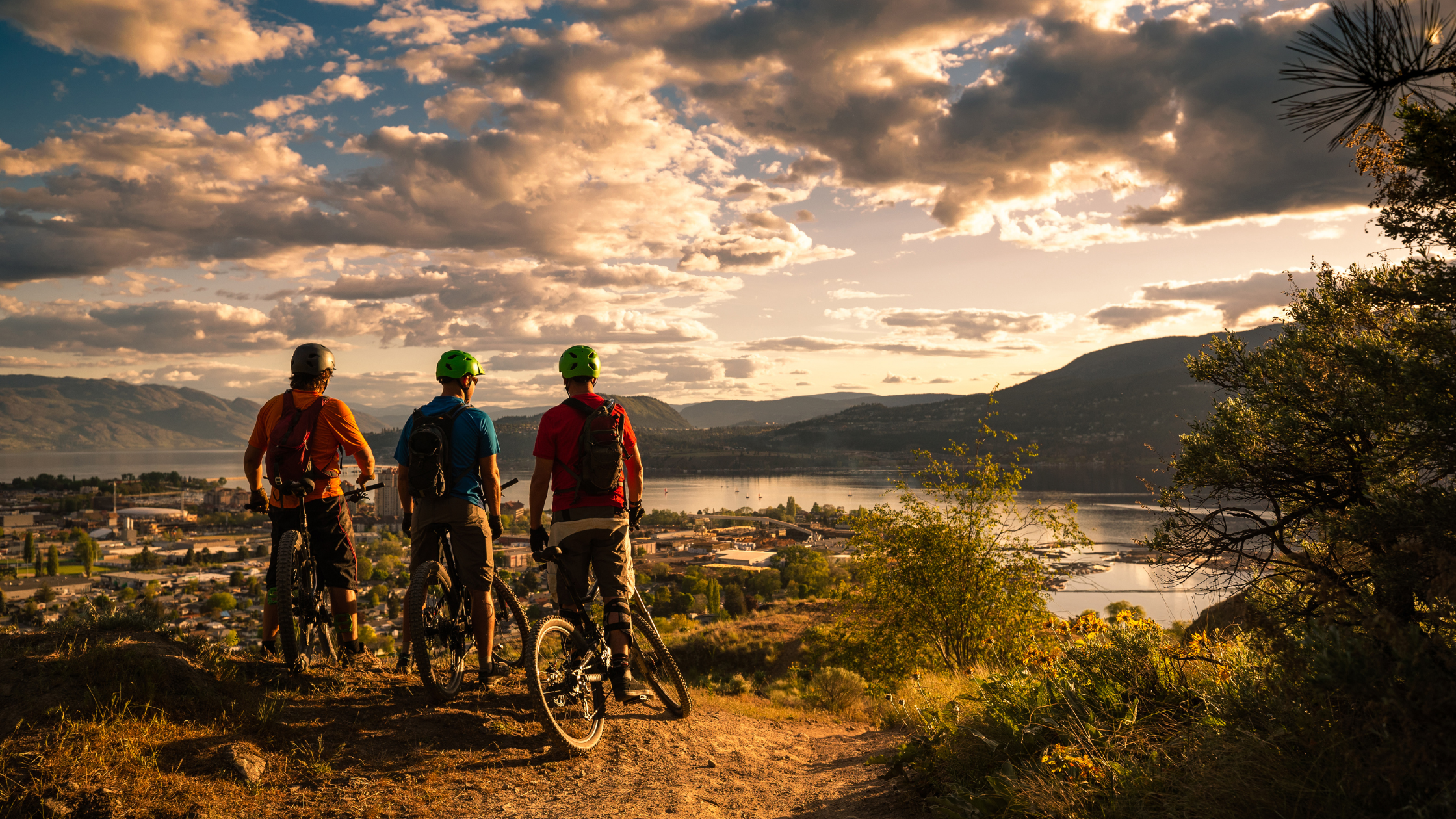 People mountain biking