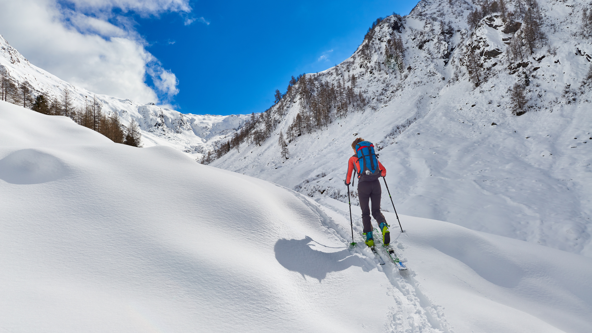 Person backcountry skiing