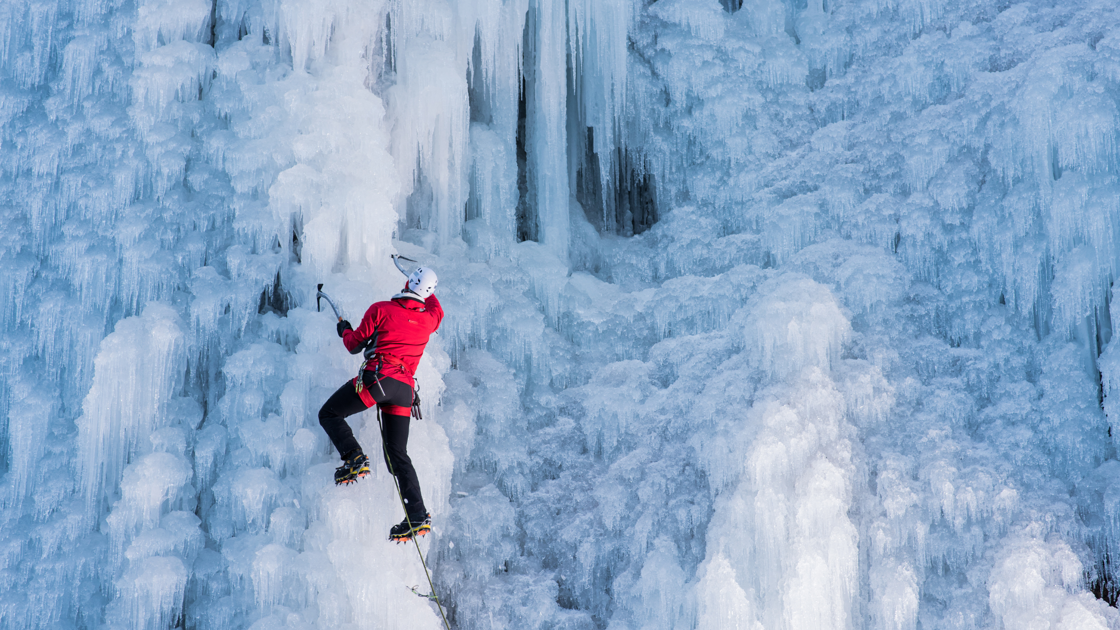 Person ice climbing