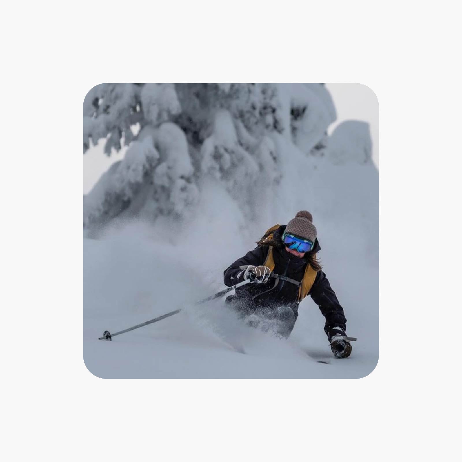 Woman skiing powder